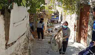 Datça'da mahalleliyi canından bezdiren ev: Tonlarca atık tahliye edildi