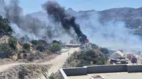 Bodrum'da şantiye yangını makilik alana sıçradı