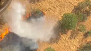 Gölgeli köyü kırsalında yangın sürüyor, söndürme helikopteri havada