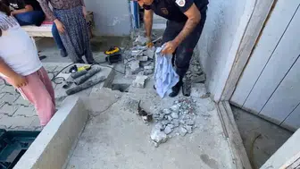 Malatya’da boruya sıkışan kediye itfaiye yardımı