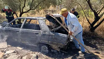 Aydın'da bir sürücü otomobilindeki yangını ormana sıçramadan durdurdu