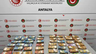 Antalya Havalimanı’nda bebek bezine saklanmış 20 milyon lira yakalandı