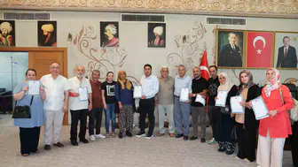 Aksu’da yıllardır beklenen tapular sahiplerine teslim edildi