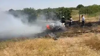 Yanan otomobildeki paraları kurtarma yarışı