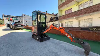 Yenice Belediyesine iş insanından mini iş makinesi desteği