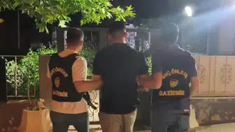 Gaziemir’de çatı katına gizlenen firari yakayı ele verdi
