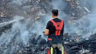 Balıkesir'de otluk alandaki yangın evlere ulaşmadan söndürüldü