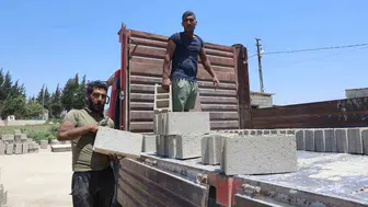 Hatay’ın 40 derecelik sıcağında ikizlerin ağır mesaisi
