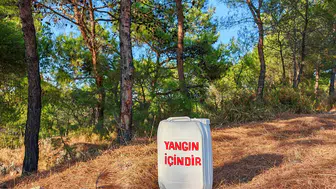 Ayvalık ormanlarında yangına karşı bidonlu savunma hattı