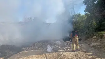 Altınözü çöplüğünde korkutan yangın büyümeden söndürüldü