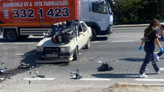 Eskişehir'de motosiklet otomobilin üzerine çıktı