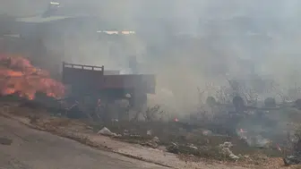Dere yatağında yangın paniği, ekipler üzüm bağlarına sıçramadan söndürdü