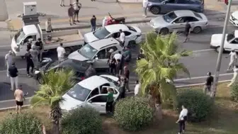 Güvenlik kamerası kayıttaydı Kırmızı ışıkta bekleyen araçların arasına daldı
