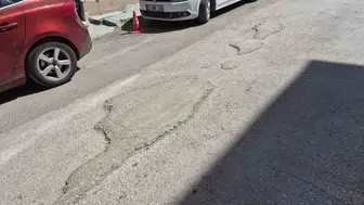 Kurtuluş Mahallesi sürücüleri çukurlu yollardan dertli