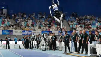 Robotlar Olimpiyatı Pekin'de Futbol, kick boks, garsonluk var