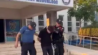 Aliağa'da aranan dolandırıcı polis ekiplerine yakalandı