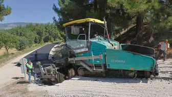 Orhaneli’de ulaşım çilesine sıcak asfalt çözümü