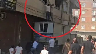 Bismil'de alevlerin arasında kalan kadına konteynerli kurtarma operasyonu