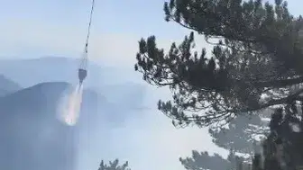 Fethiye'de orman yangınına havadan kuşatma: Alevler sarp arazide durduruldu