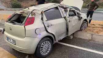 Çine'de korkutan kaza: Refüje çarpan otomobil takla attı