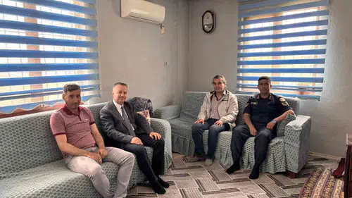 Karacasu protokolünden şehit aileleri ve gazilere bayram ziyareti