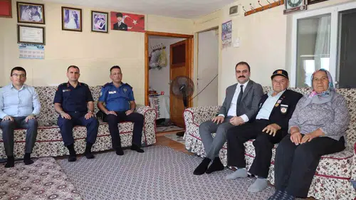 Karacasu Kaymakamı şehit aileleri ve gazilerle bir araya geldi