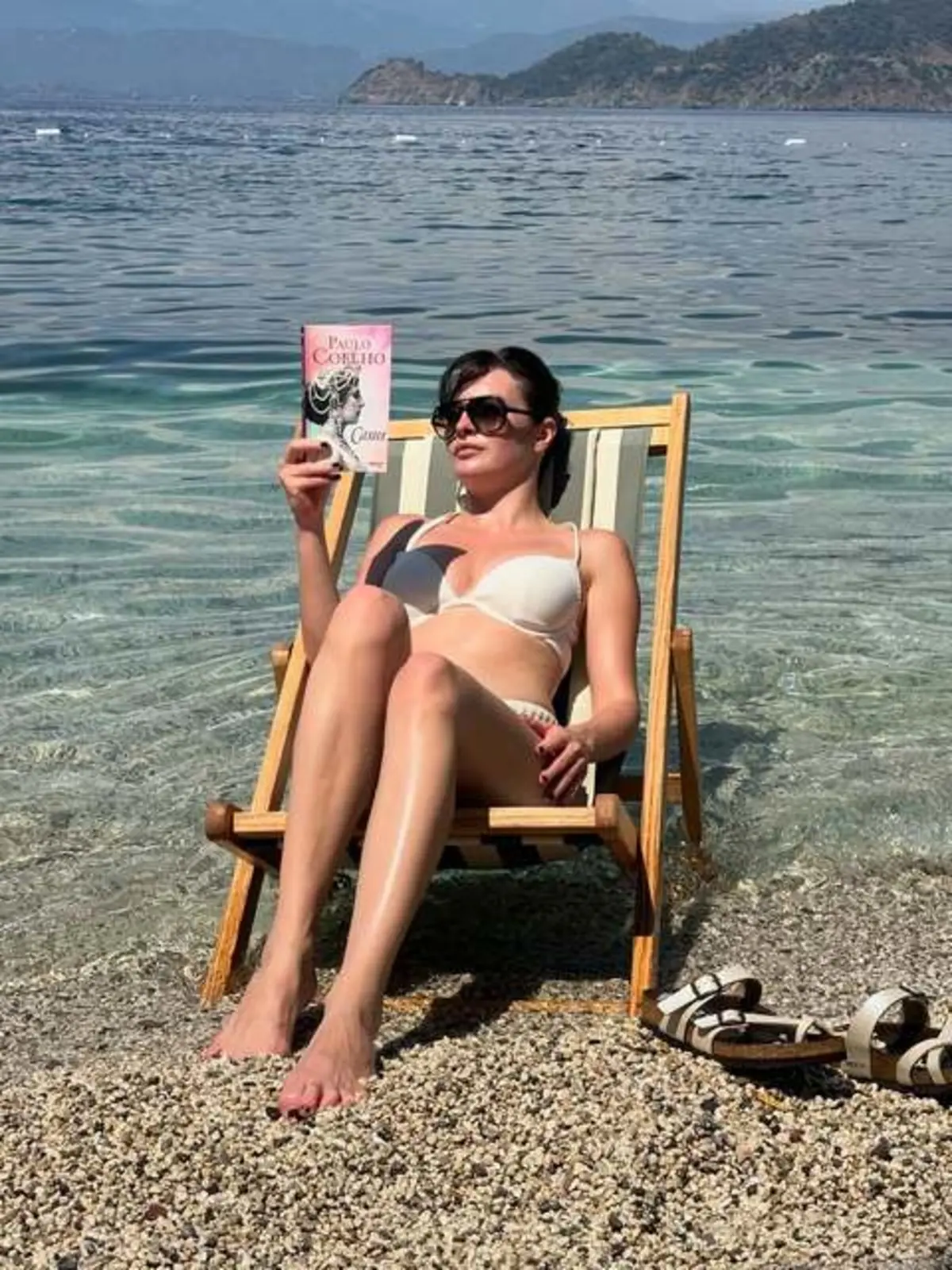 Melis Sezen tatile çıktı! Bikinisini giyip fiziğini sergiledi 1