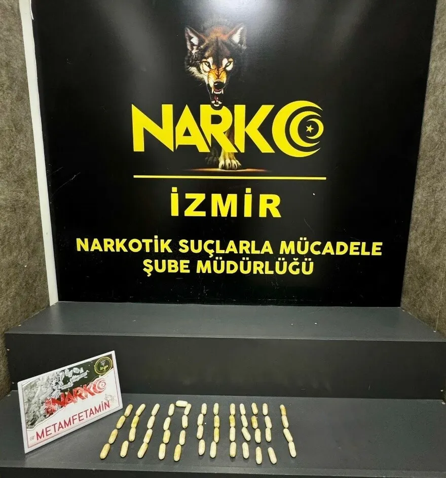 Midesinde yarım kilo uyuşturucuyla yakalandı