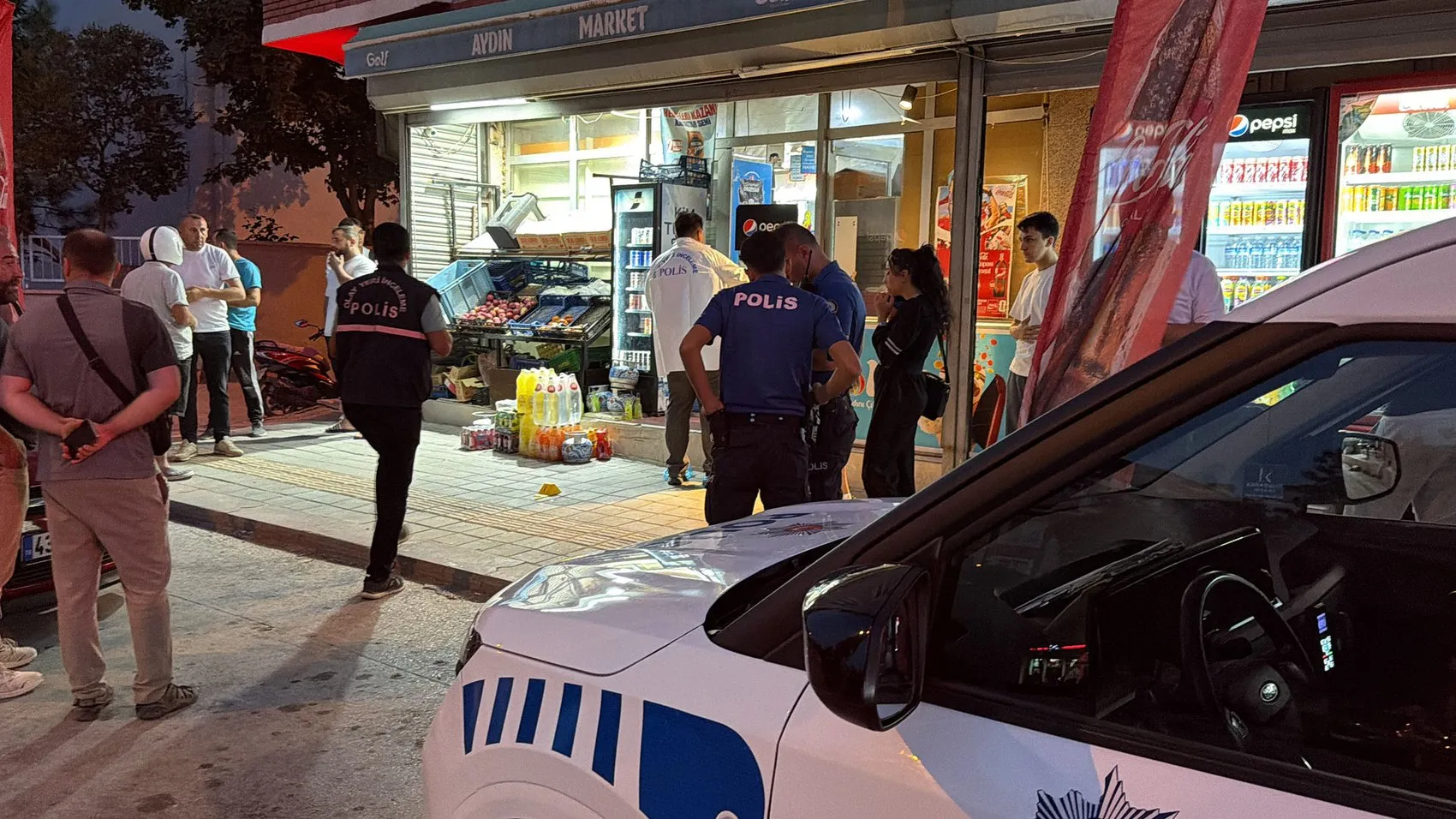 Marketin kapısına sığındı Kütahya'da eski eş bıçakladı