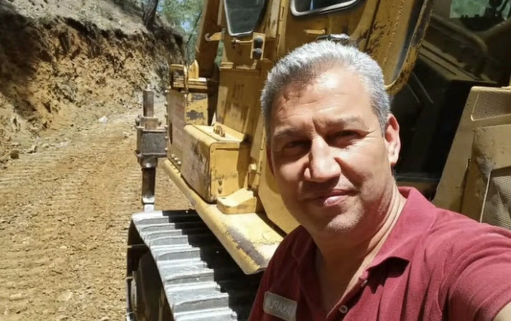 Muğla’da evleri kurtarmak için alevlerin karşısına dozerle çıktı